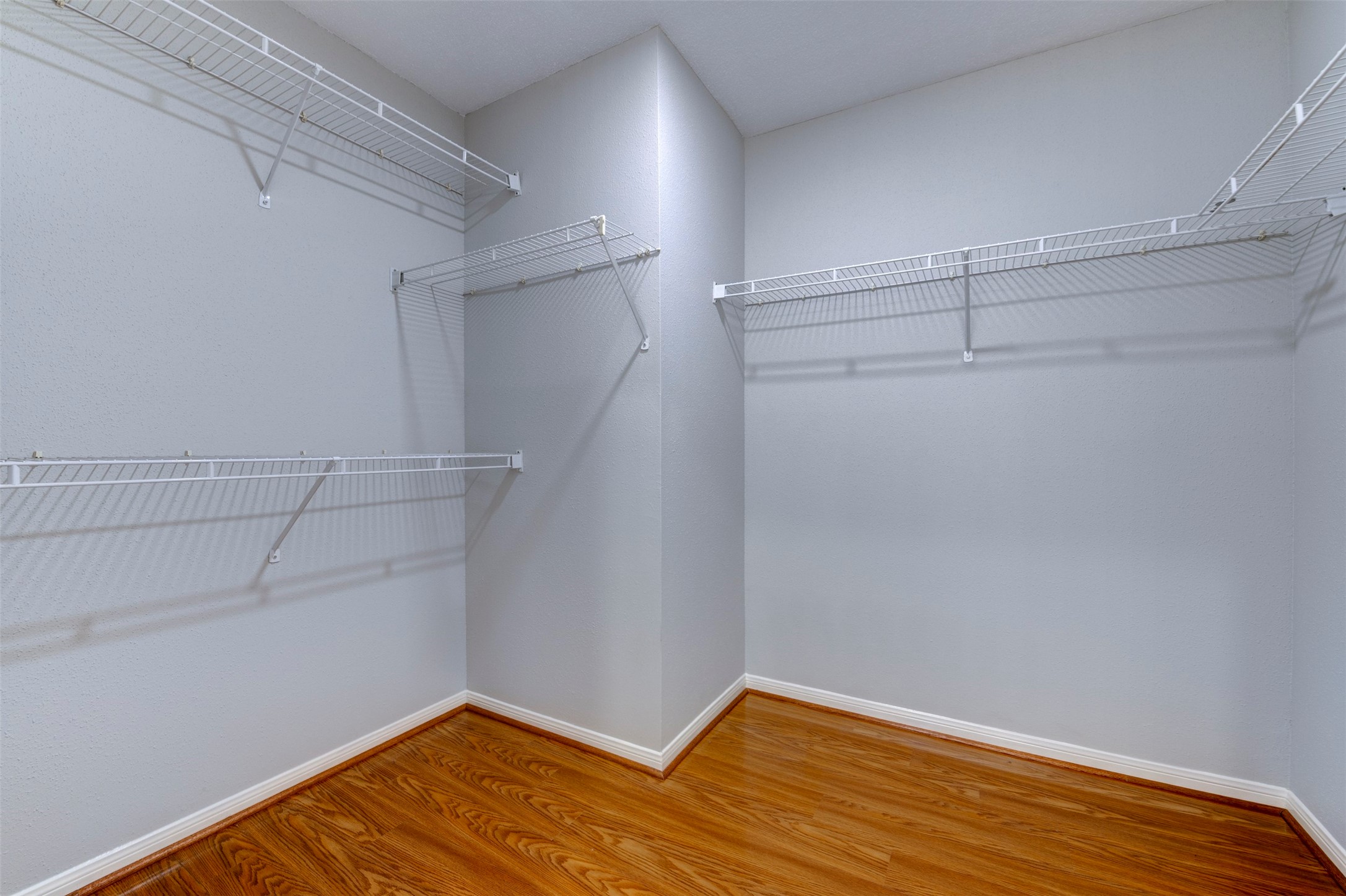 11434 High Bridge Court Houston, TX 77065 - Photo 29 of 31 a view of a room with wooden floor