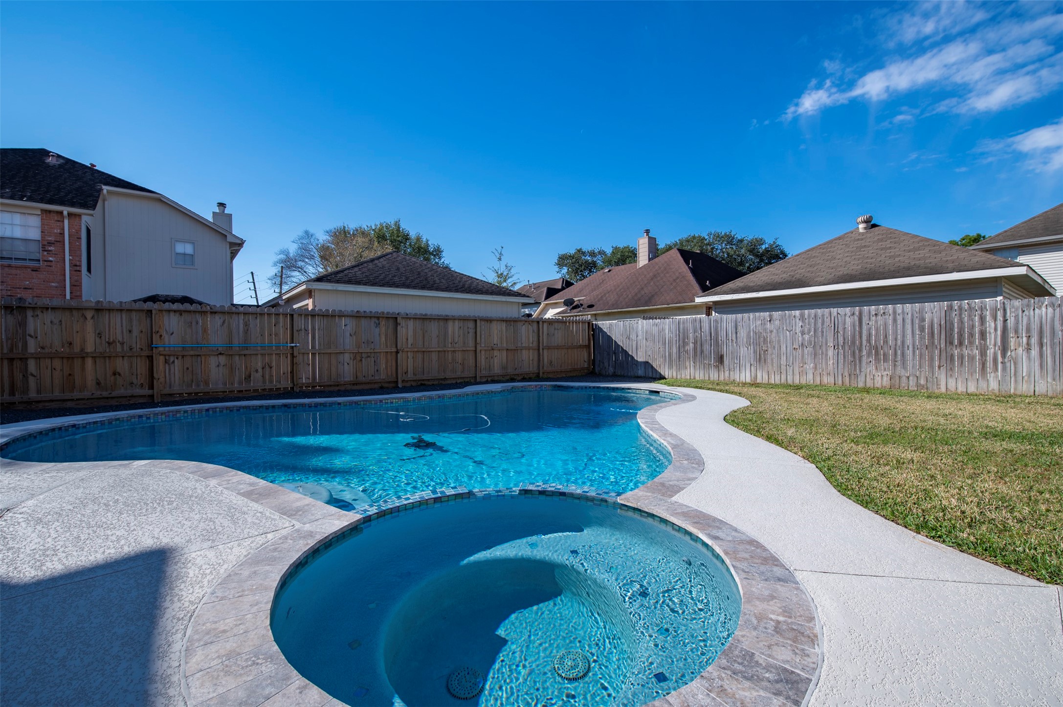11434 High Bridge Court Houston, TX 77065 - Photo 31 of 31 a view of a house with a swimming pool