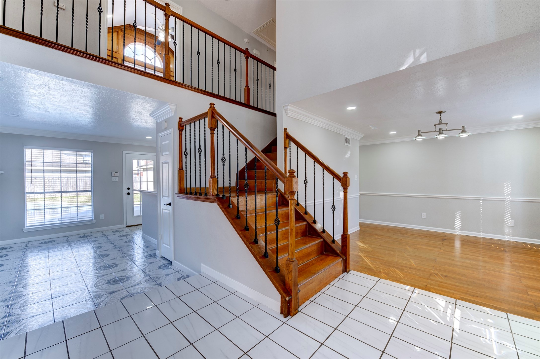 11434 High Bridge Court Houston, TX 77065 - Photo 4 of 31 a view of an entryway with wooden floor