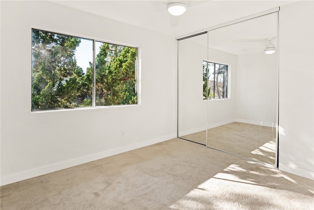10353 Carefree Drive Santee, CA 92071 - Photo 14 of 27 a view of an empty room with a window