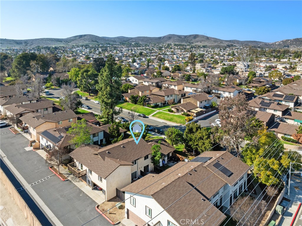 10353 Carefree Drive Santee, CA 92071 - Photo 22 of 27 an aerial view of residential houses with outdoor space