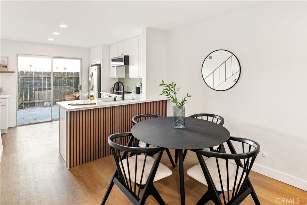 10353 Carefree Drive Santee, CA 92071 - Photo 5 of 27 a view of a dining room with furniture and a large window
