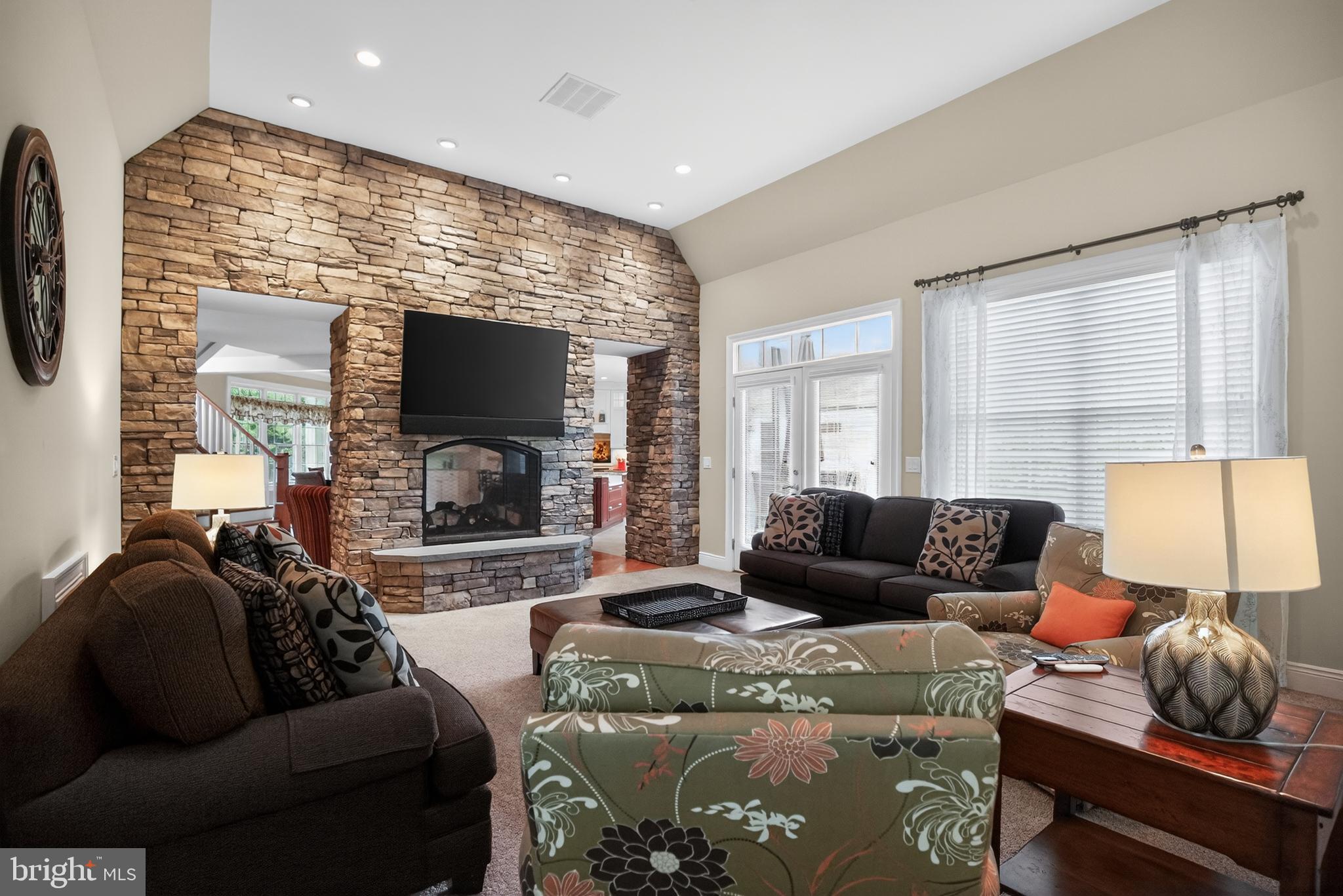 1031 Coates Road Jenkintown, PA 19046 - Photo 27 of 66 a living room with furniture and a flat screen tv
