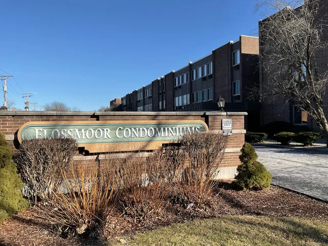 a view of a building with a street
