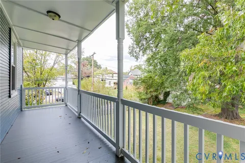 a view of a porch with a big yard