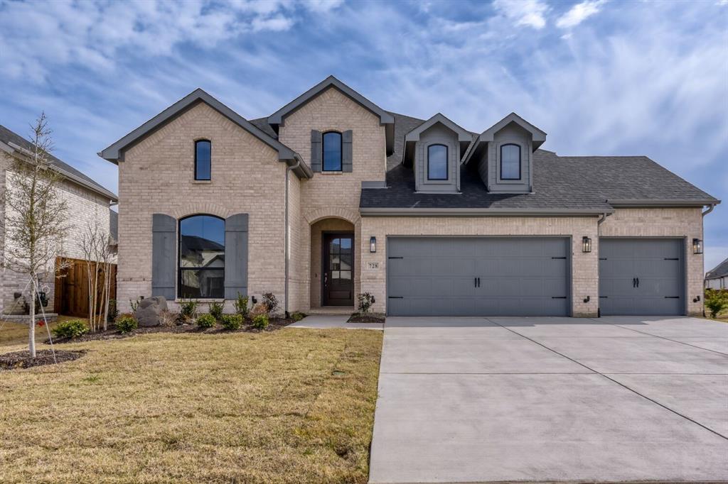 728 Treeline Way Mansfield, TX 76063 - Photo 1 of 1 French country home featuring brick siding, a garage, concrete driveway, and roof with shingles