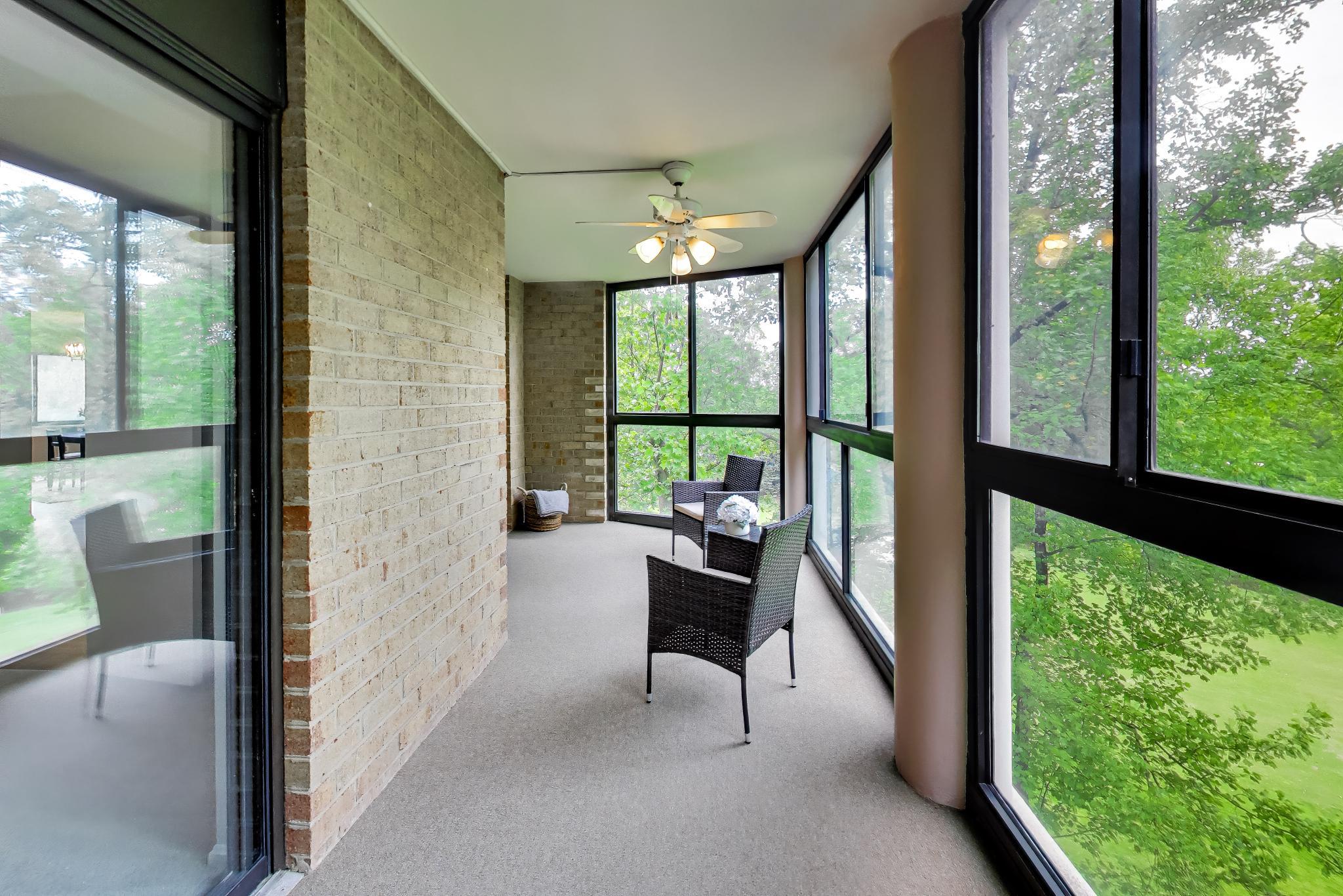 15100 Interlachen Drive, Unit 4612 Silver Spring, MD 20906 - Photo 10 of 19 Sunroom Overlooking the Golf Course. View 1.