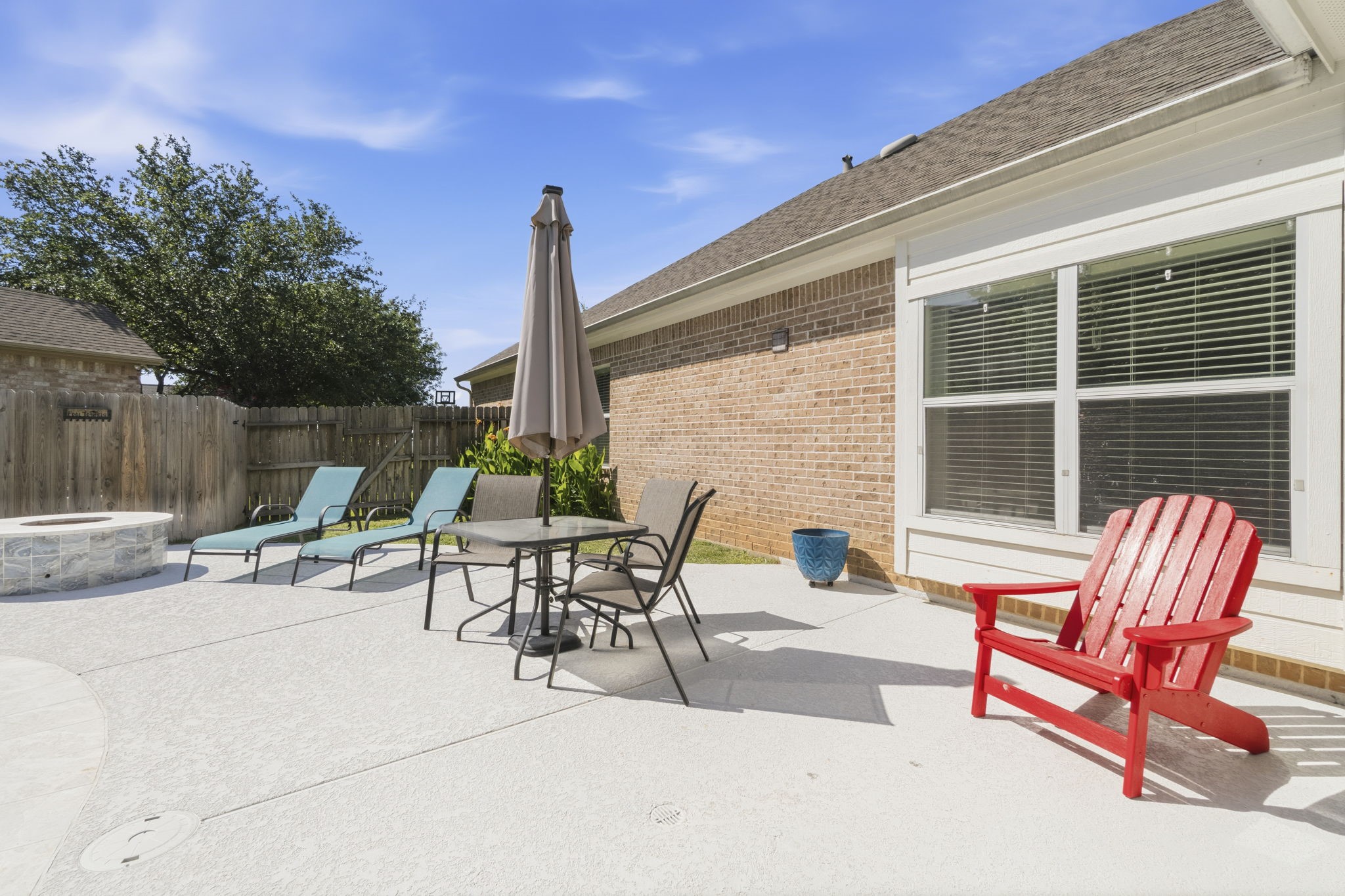 10802 Windswept Montgomery, TX 77356 - Photo 7 of 42 a view of a patio with a table and chairs