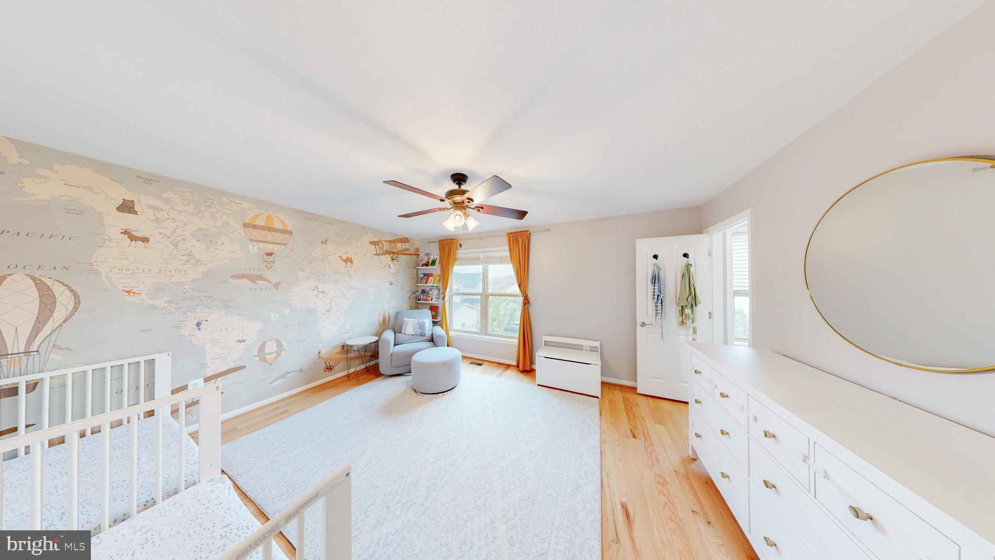 13227 Deer Highlands Way Silver Spring, MD 20906 - Photo 11 of 20 a bedroom with furniture and a wooden floor