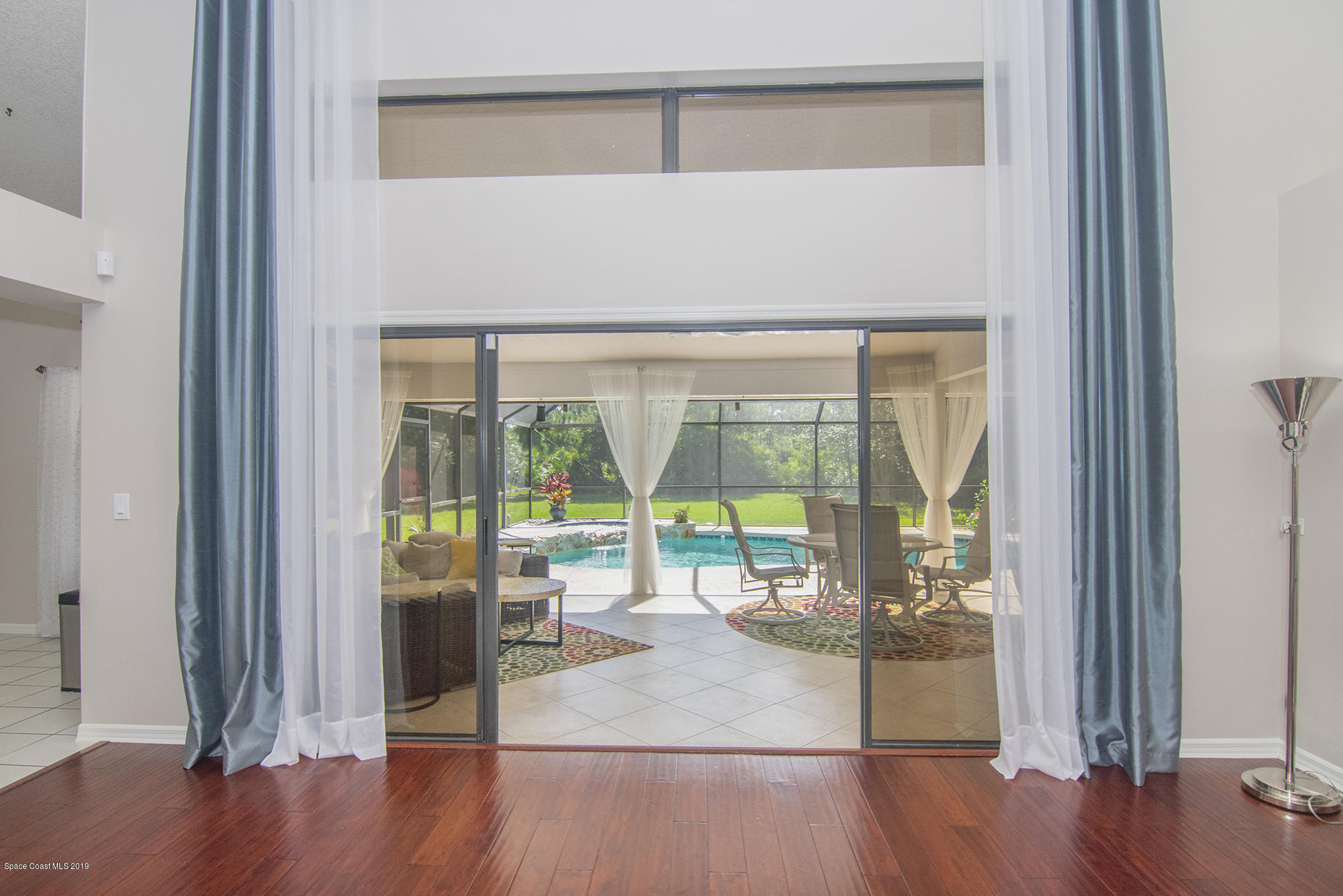 4188 Sparrow Hawk Road Melbourne, FL 32934 - Photo 14 of 40 65 Family Room