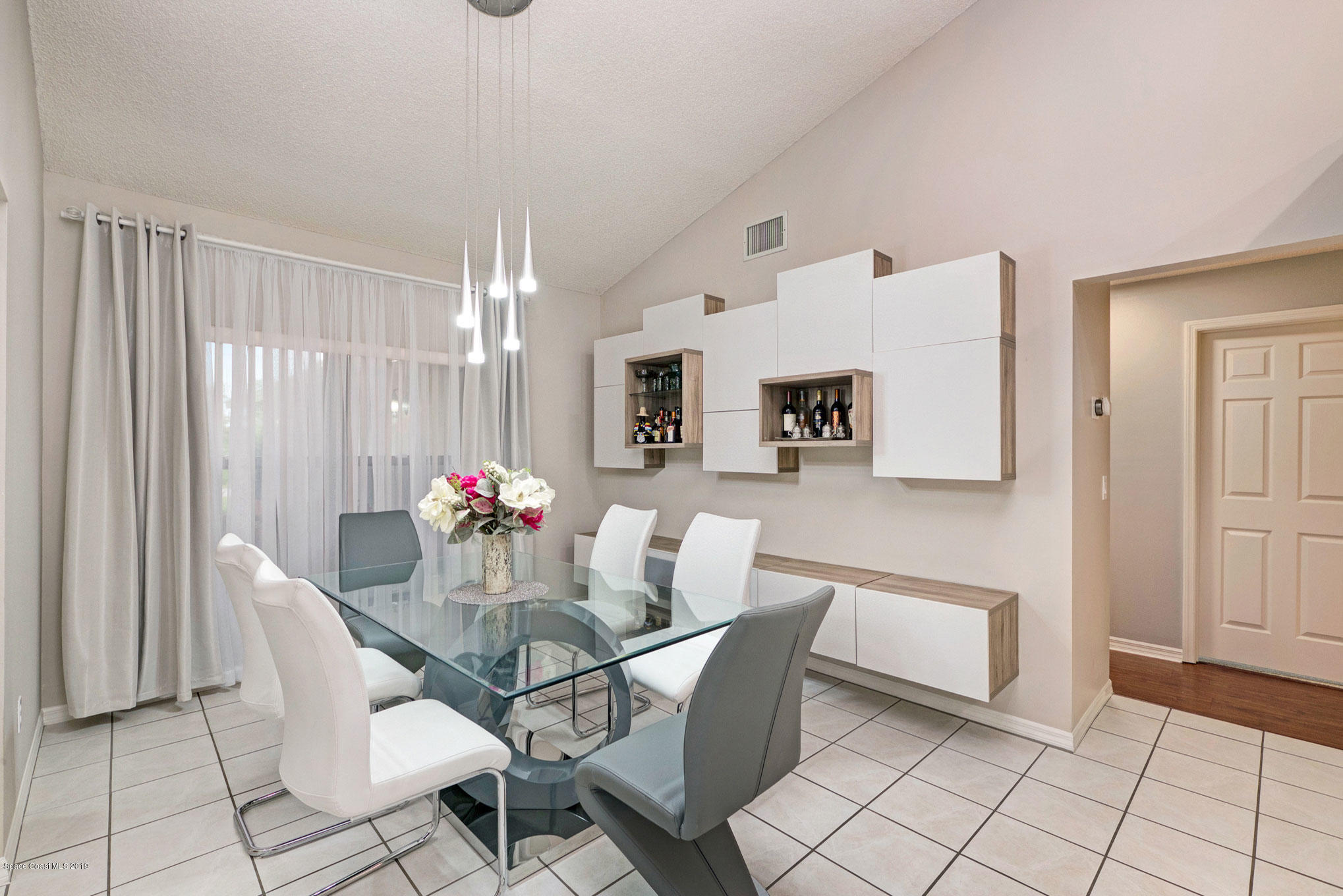 4188 Sparrow Hawk Road Melbourne, FL 32934 - Photo 16 of 40 80 Dining Room
