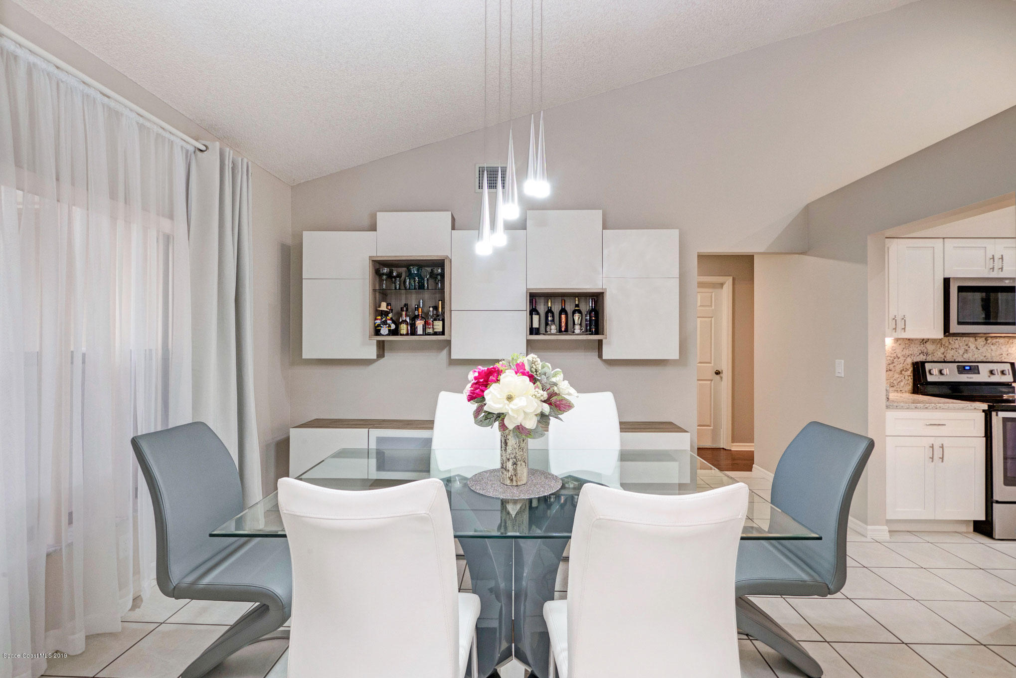 4188 Sparrow Hawk Road Melbourne, FL 32934 - Photo 18 of 40 90 Dining Room