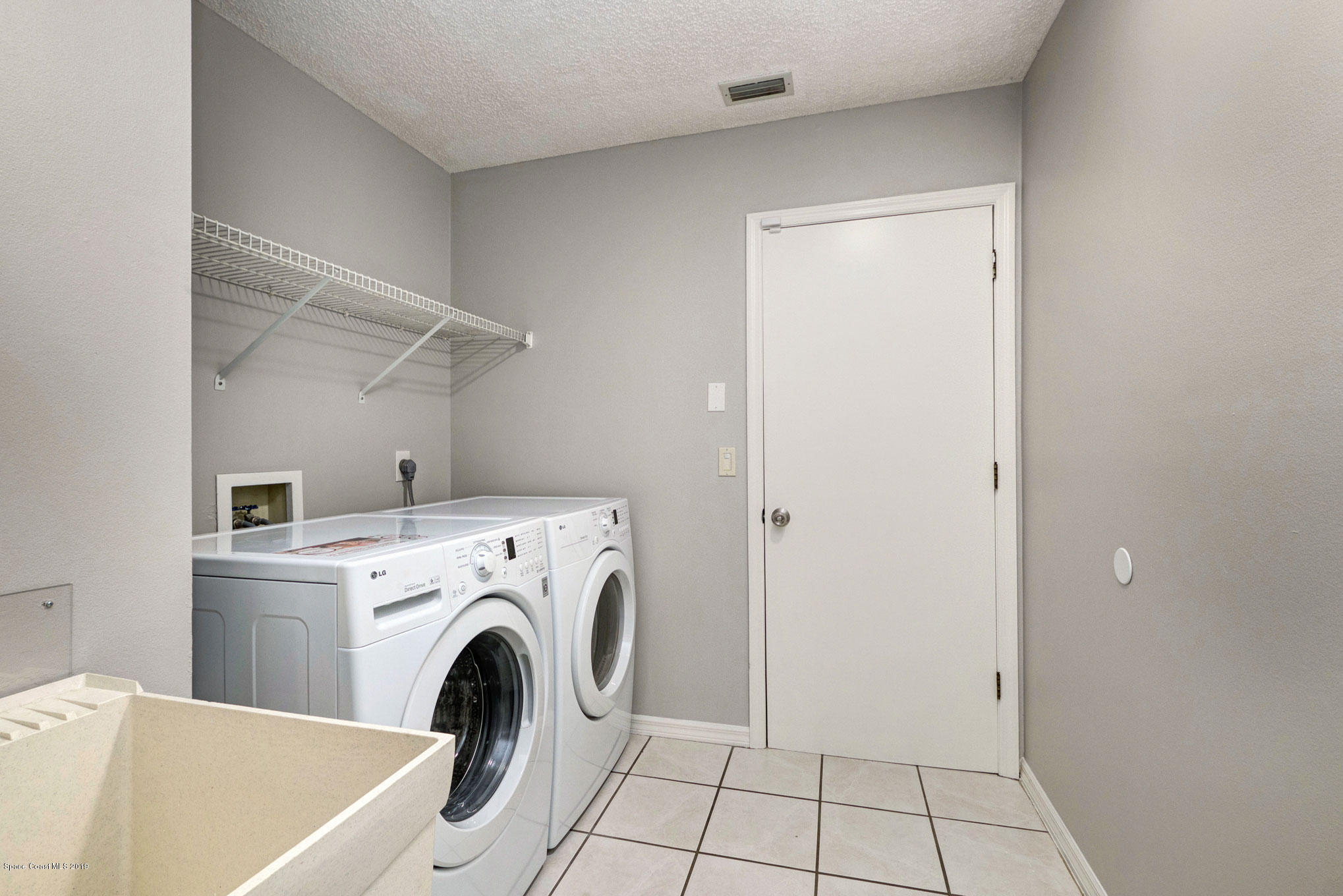 4188 Sparrow Hawk Road Melbourne, FL 32934 - Photo 30 of 40 190 Laundry Room