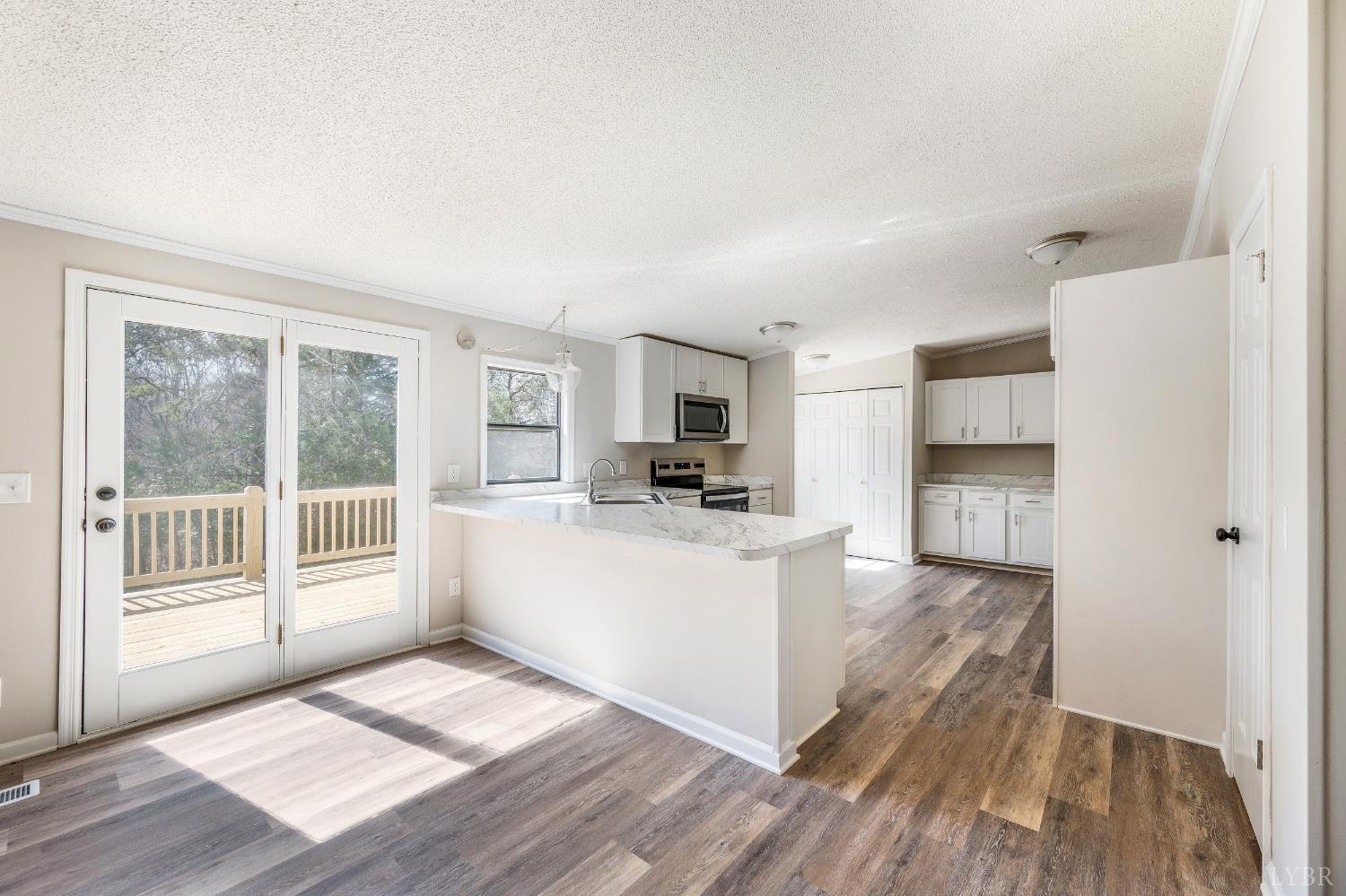 111 Bandy Road Gladys, VA 24554 - Photo 15 of 54 a living room with furniture and a flat screen tv