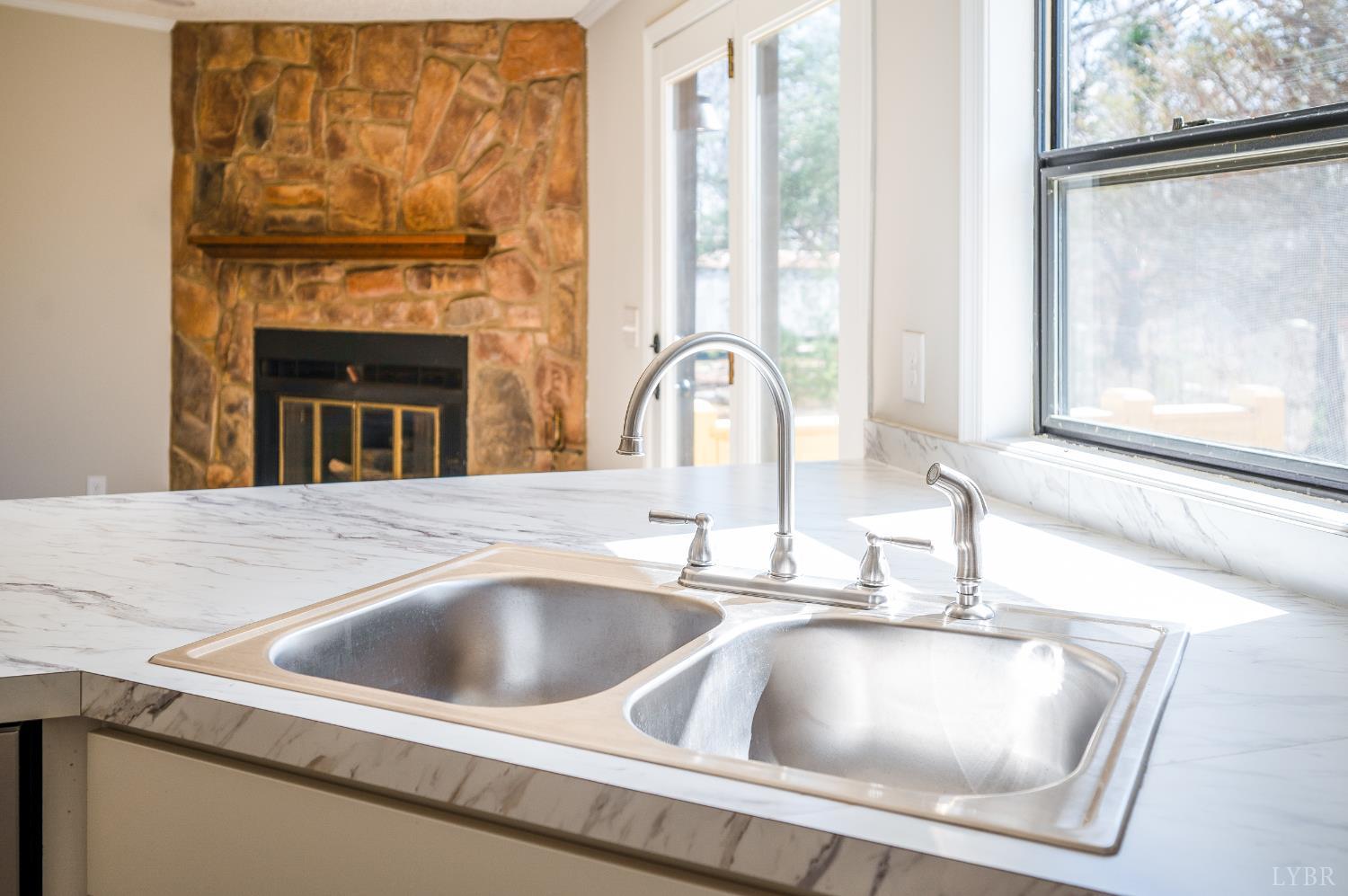 111 Bandy Road Gladys, VA 24554 - Photo 18 of 54 a kitchen with a sink and a window