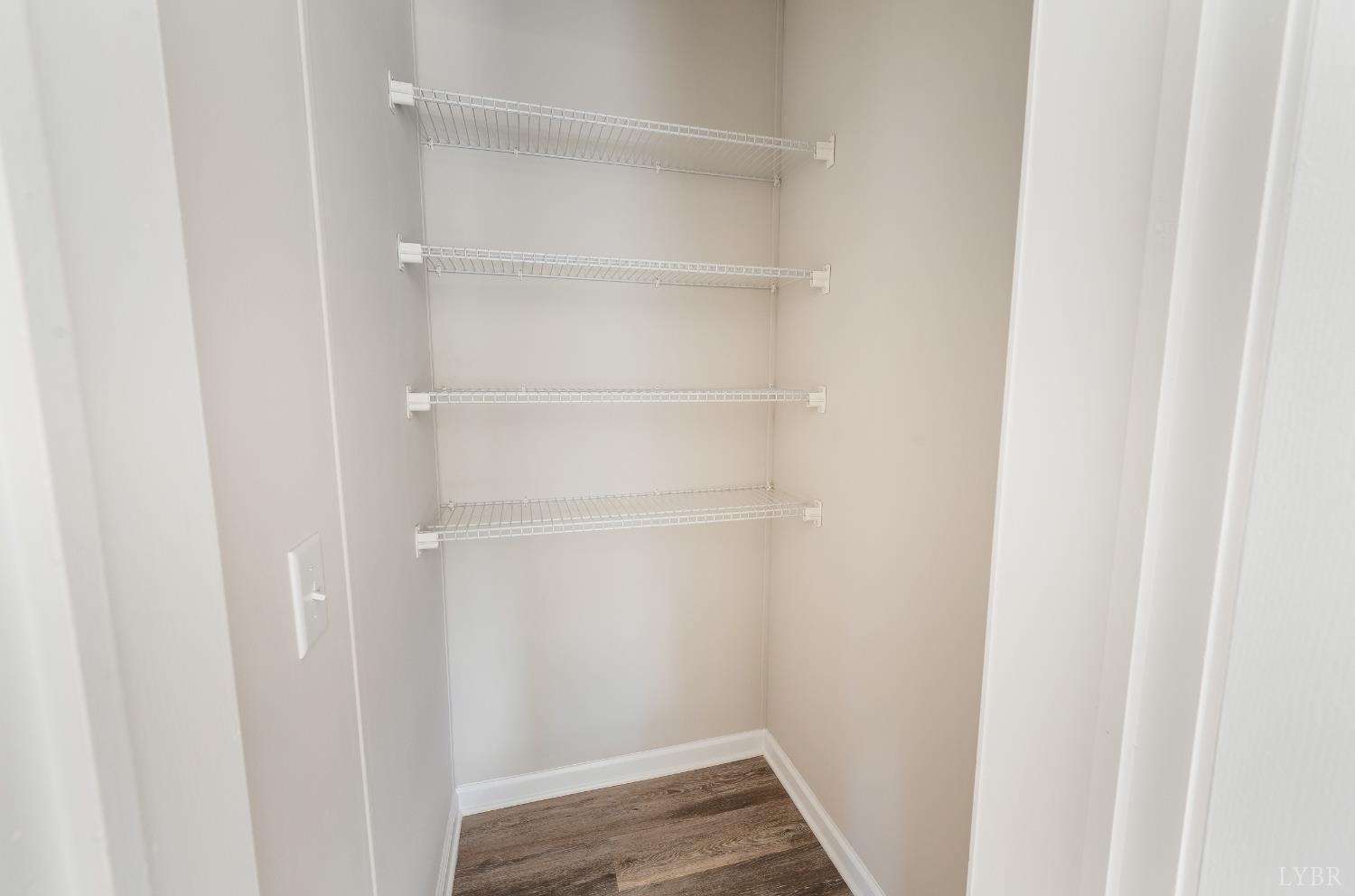 111 Bandy Road Gladys, VA 24554 - Photo 21 of 54 a view of walk in closet with empty racks