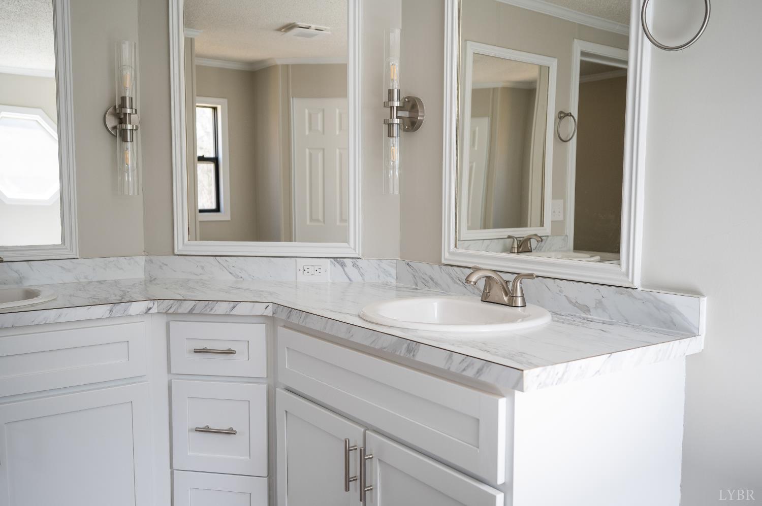 111 Bandy Road Gladys, VA 24554 - Photo 28 of 54 a bathroom with a sink and a mirror