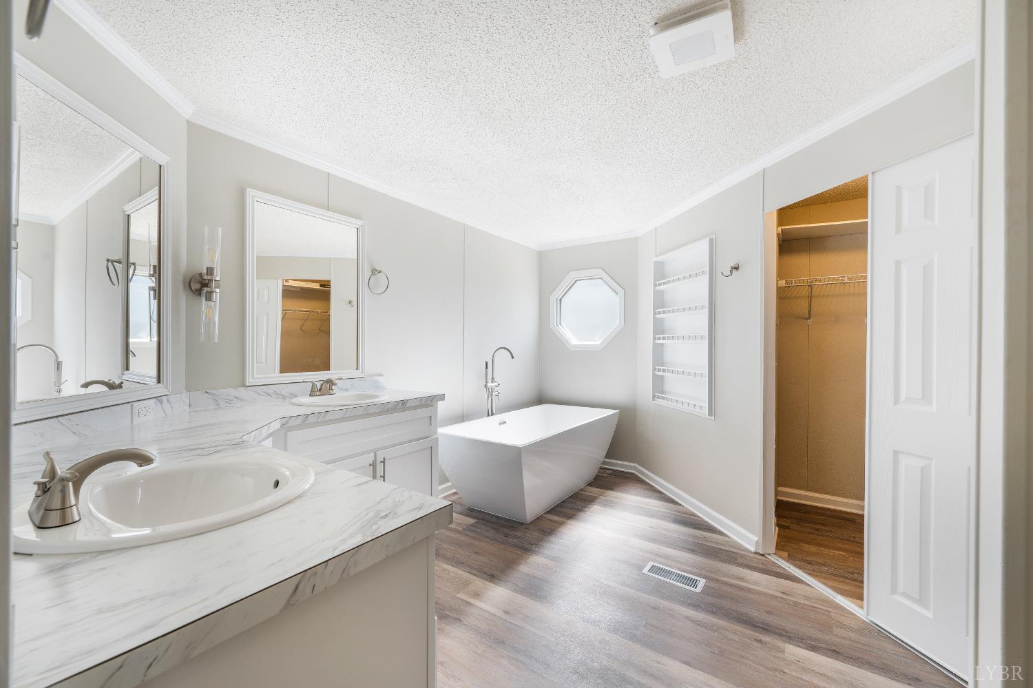 111 Bandy Road Gladys, VA 24554 - Photo 29 of 54 a bathroom with a sink double vanity granite tub and mirror