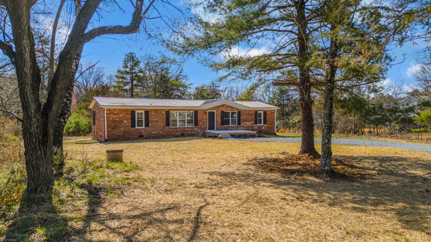 111 Bandy Road Gladys, VA 24554 - Photo 44 of 54 a front view of a house with a yard