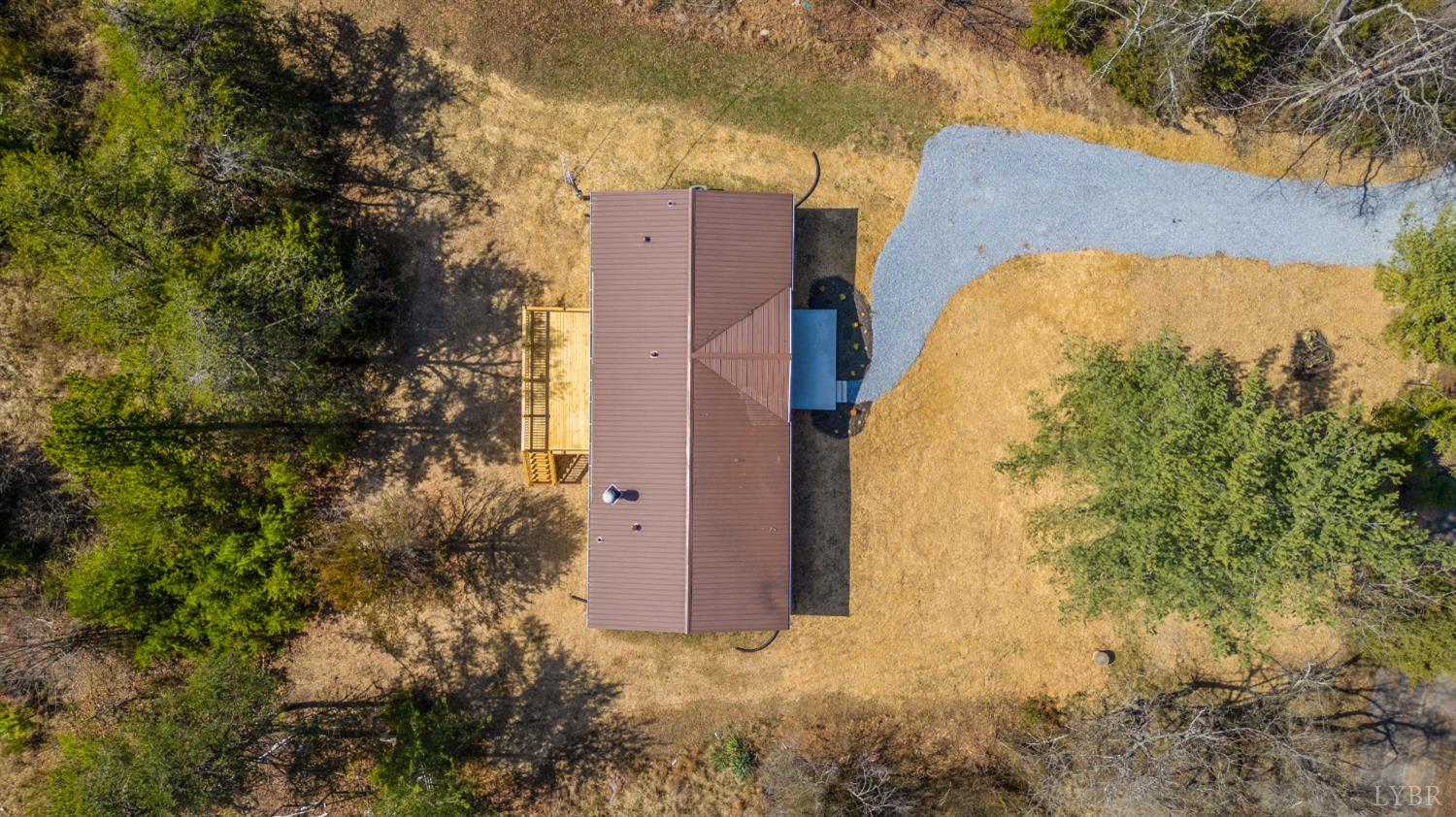 111 Bandy Road Gladys, VA 24554 - Photo 47 of 54 a view of a house with a yard and large tree