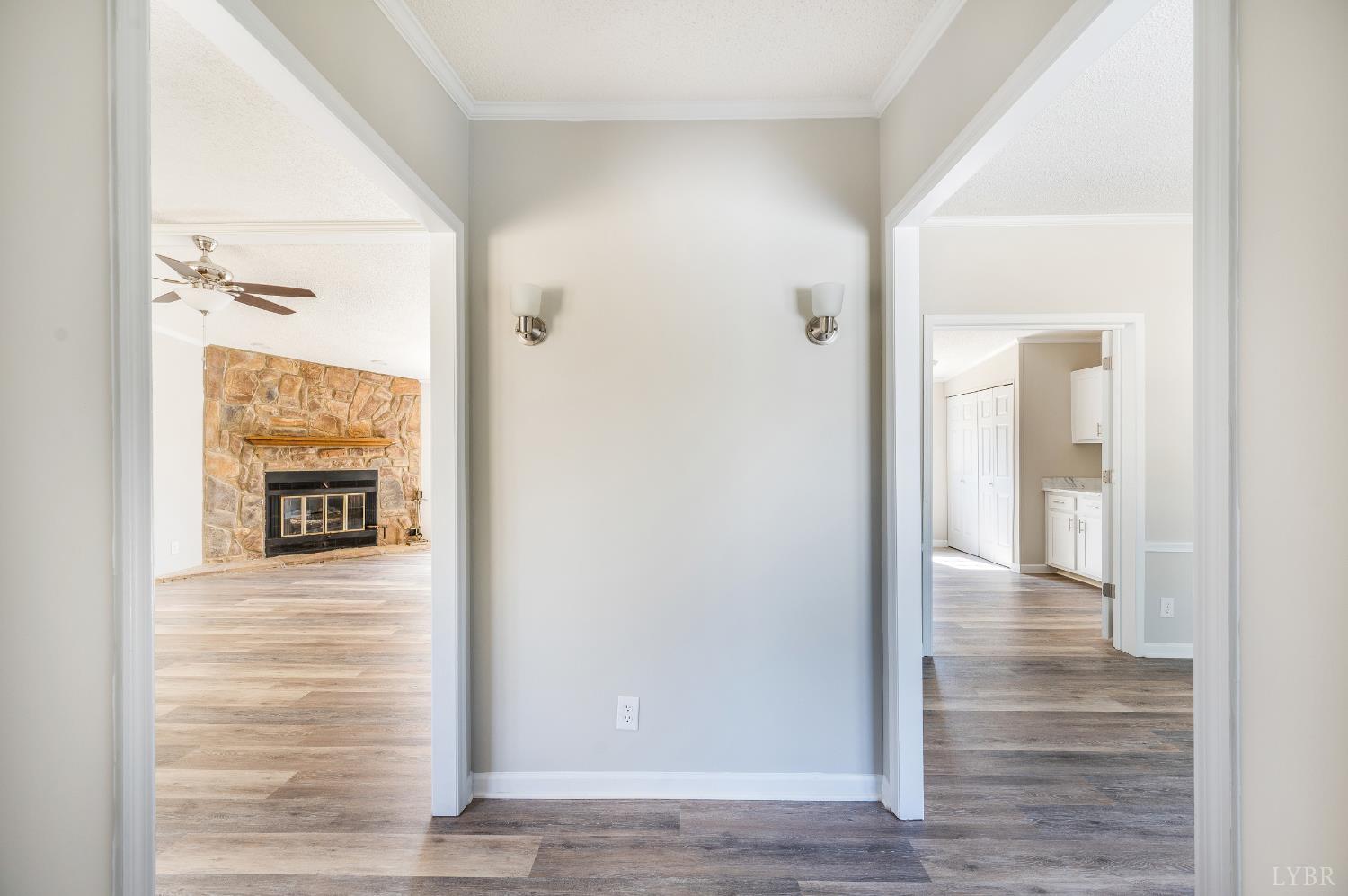 111 Bandy Road Gladys, VA 24554 - Photo 50 of 54 a view of a hallway with wooden floor and a bathroom