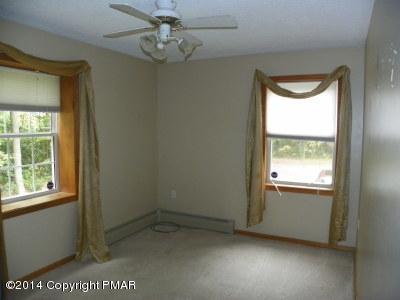 543 Rinker Road Stroudsburg, PA 18360 - Photo 2 of 8 a view of an empty room and a window