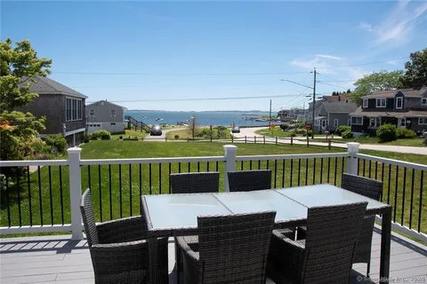 a view of a chairs and table on the terrace