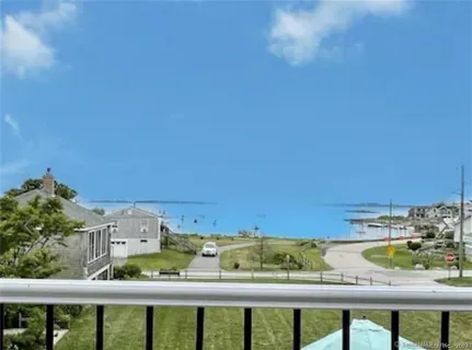 a view of a balcony with city view