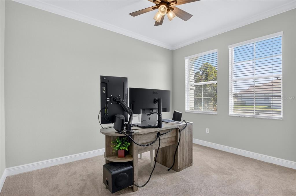 650 Setting Sun Drive Winter Garden, FL 34787 - Photo 20 of 60 a dining room with furniture and window