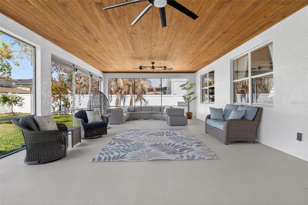 650 Setting Sun Drive Winter Garden, FL 34787 - Photo 36 of 60 a living room with furniture and a large window