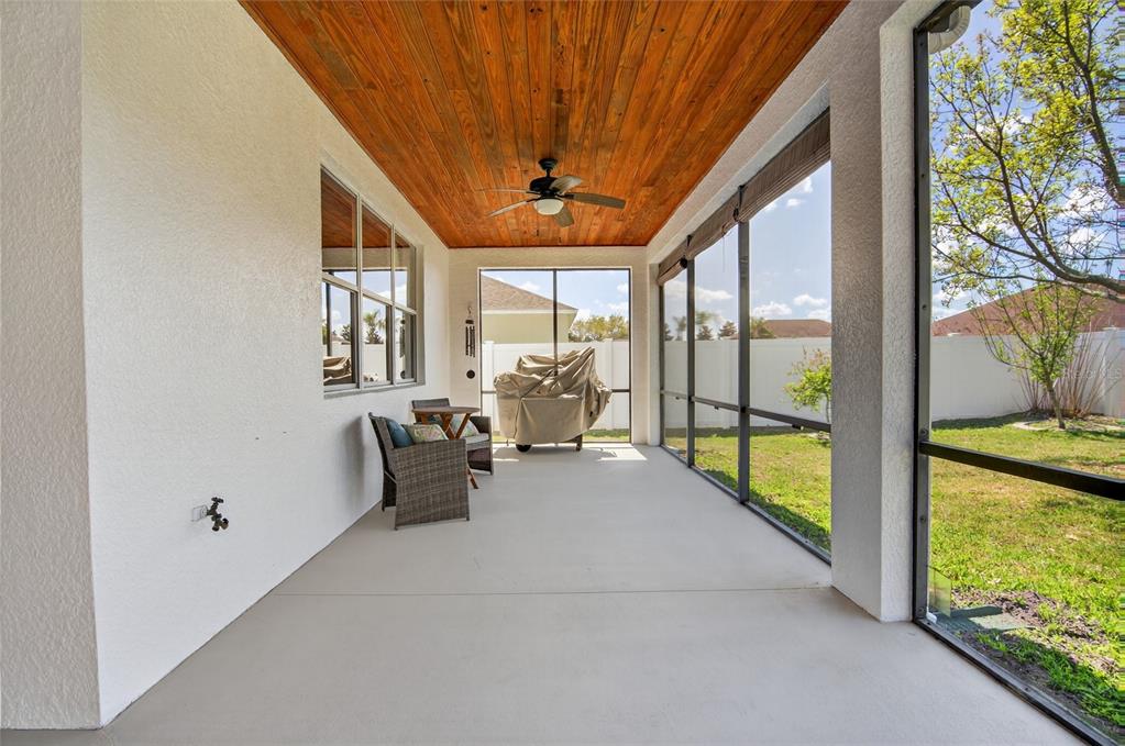 650 Setting Sun Drive Winter Garden, FL 34787 - Photo 37 of 60 a living room with furniture and a large window