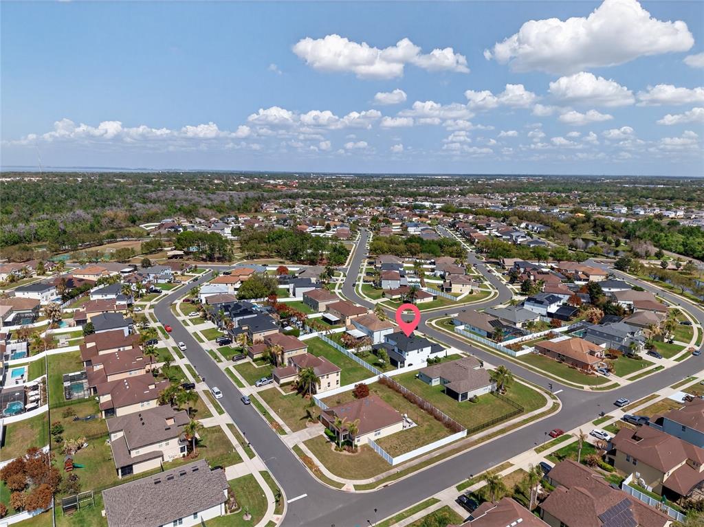 650 Setting Sun Drive Winter Garden, FL 34787 - Photo 43 of 60 an aerial view of residential houses with city view