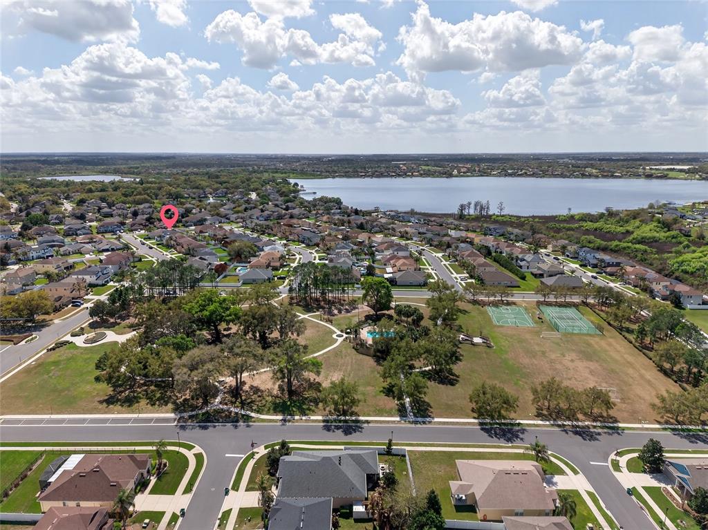 650 Setting Sun Drive Winter Garden, FL 34787 - Photo 48 of 60 an aerial view of residential houses with outdoor space