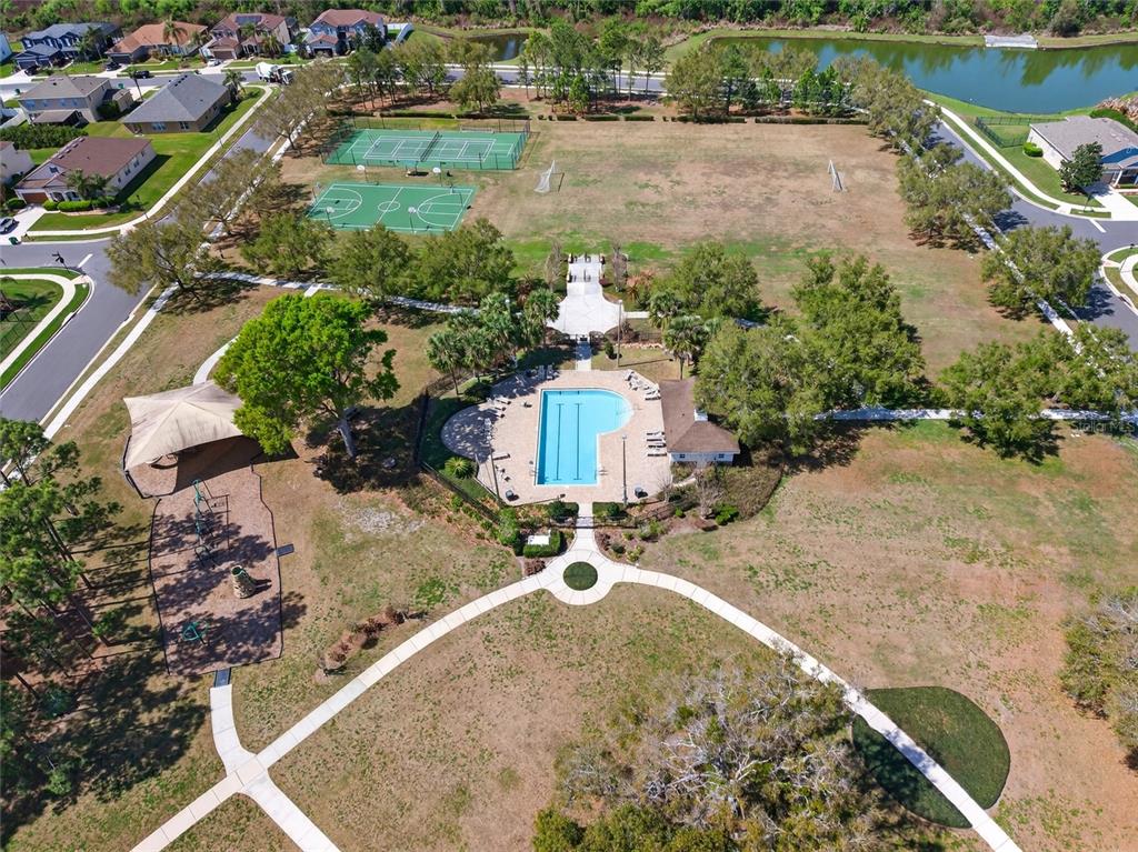 650 Setting Sun Drive Winter Garden, FL 34787 - Photo 50 of 60 an aerial view of a house with a yard and lake view