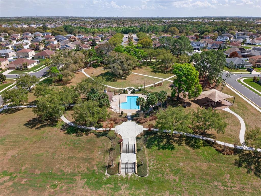 650 Setting Sun Drive Winter Garden, FL 34787 - Photo 53 of 60 a view of a house with a yard and lake view
