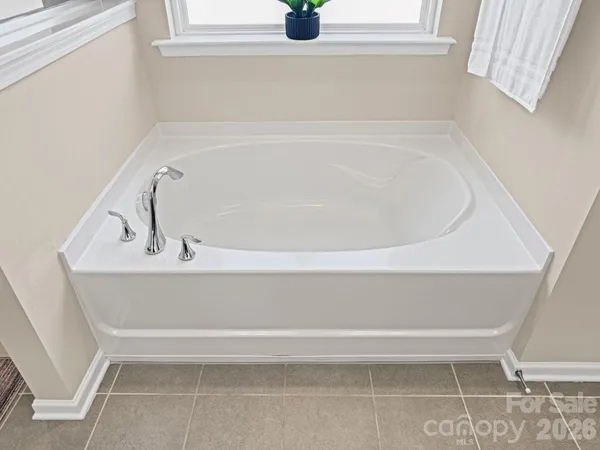 a bathroom with a bathtub