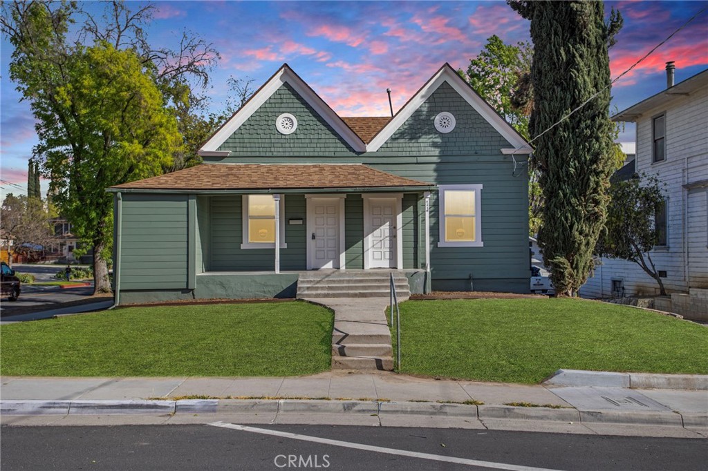 4210 Brockton Avenue Riverside, CA 92501 - Photo 1 of 1 a front view of a house with a yard