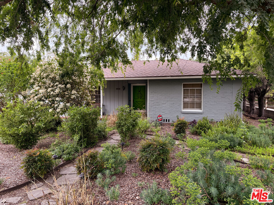 1829 Pepper Drive Altadena, CA 91001 - Photo 1 of 2 a front view of a house with garden