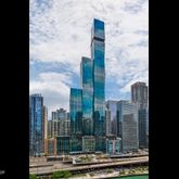 a view of a city from a corridor