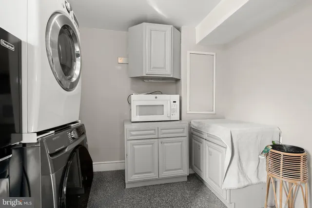 a view of a backyard with sitting area