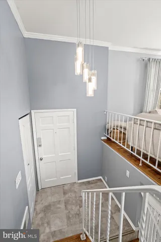 a view of a hallway with entryway