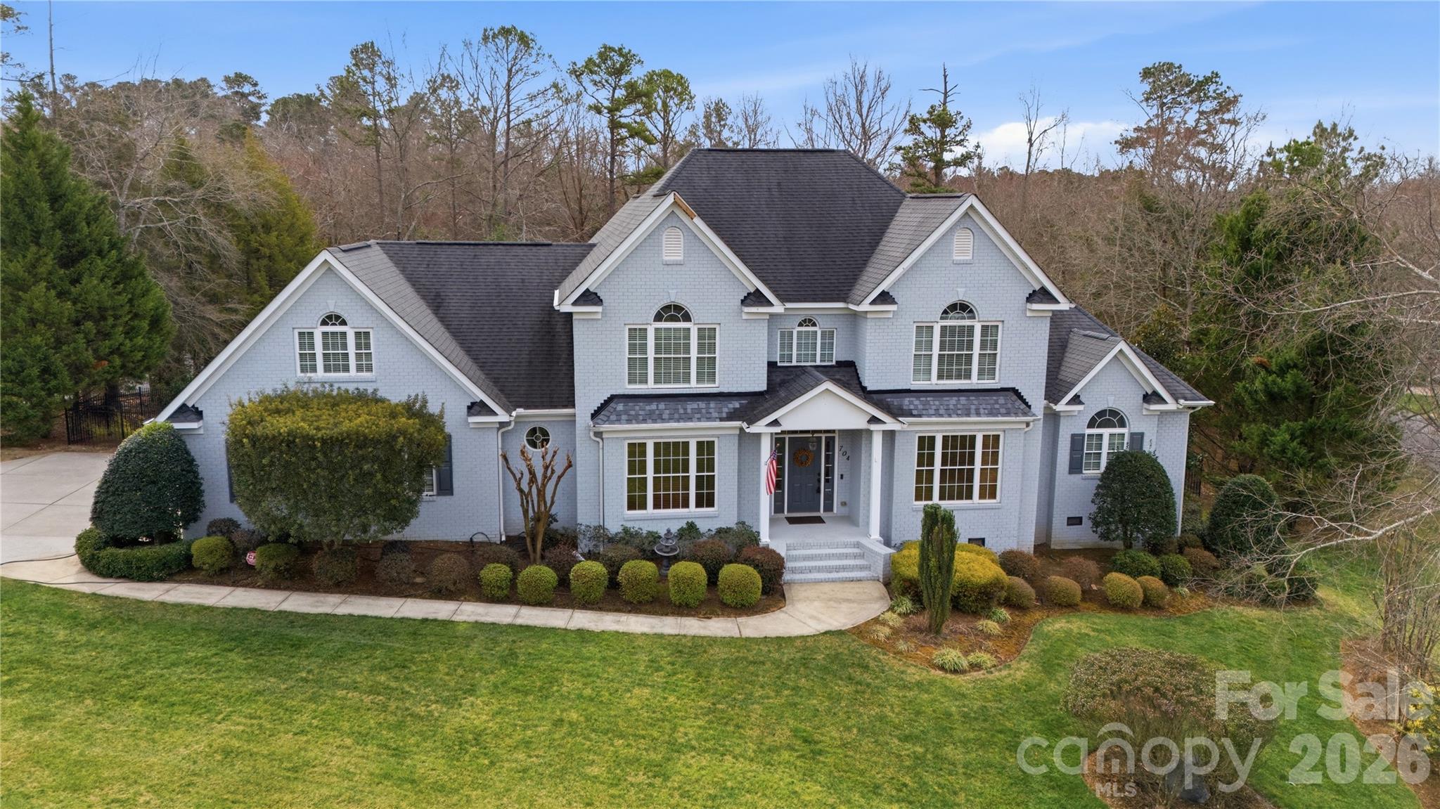 704 Mayfield Court Fort Mill, SC 29715 - Photo 1 of 48 a view of a house with a yard and potted plants