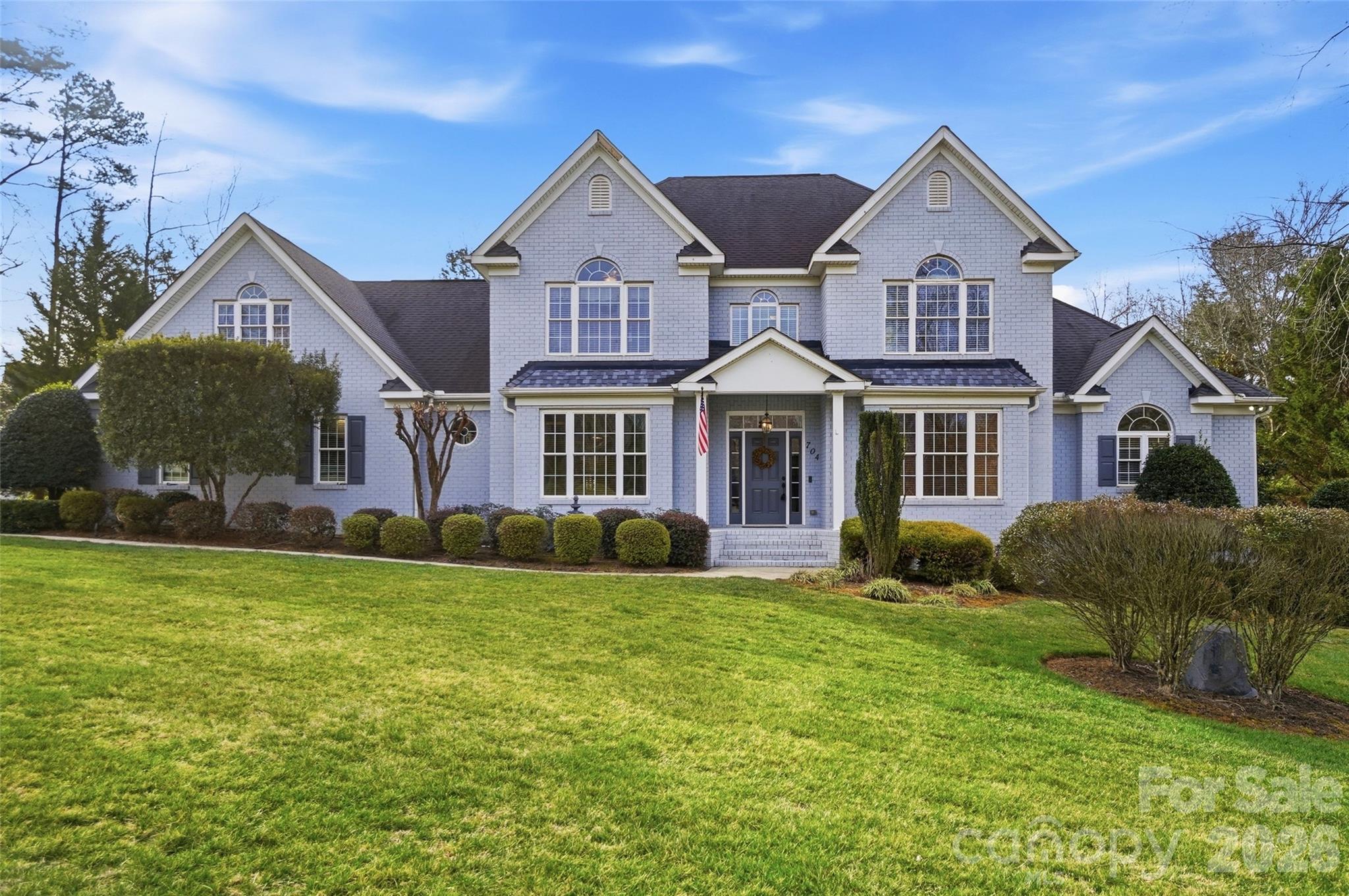 704 Mayfield Court Fort Mill, SC 29715 - Photo 2 of 48 a front view of a house with a yard