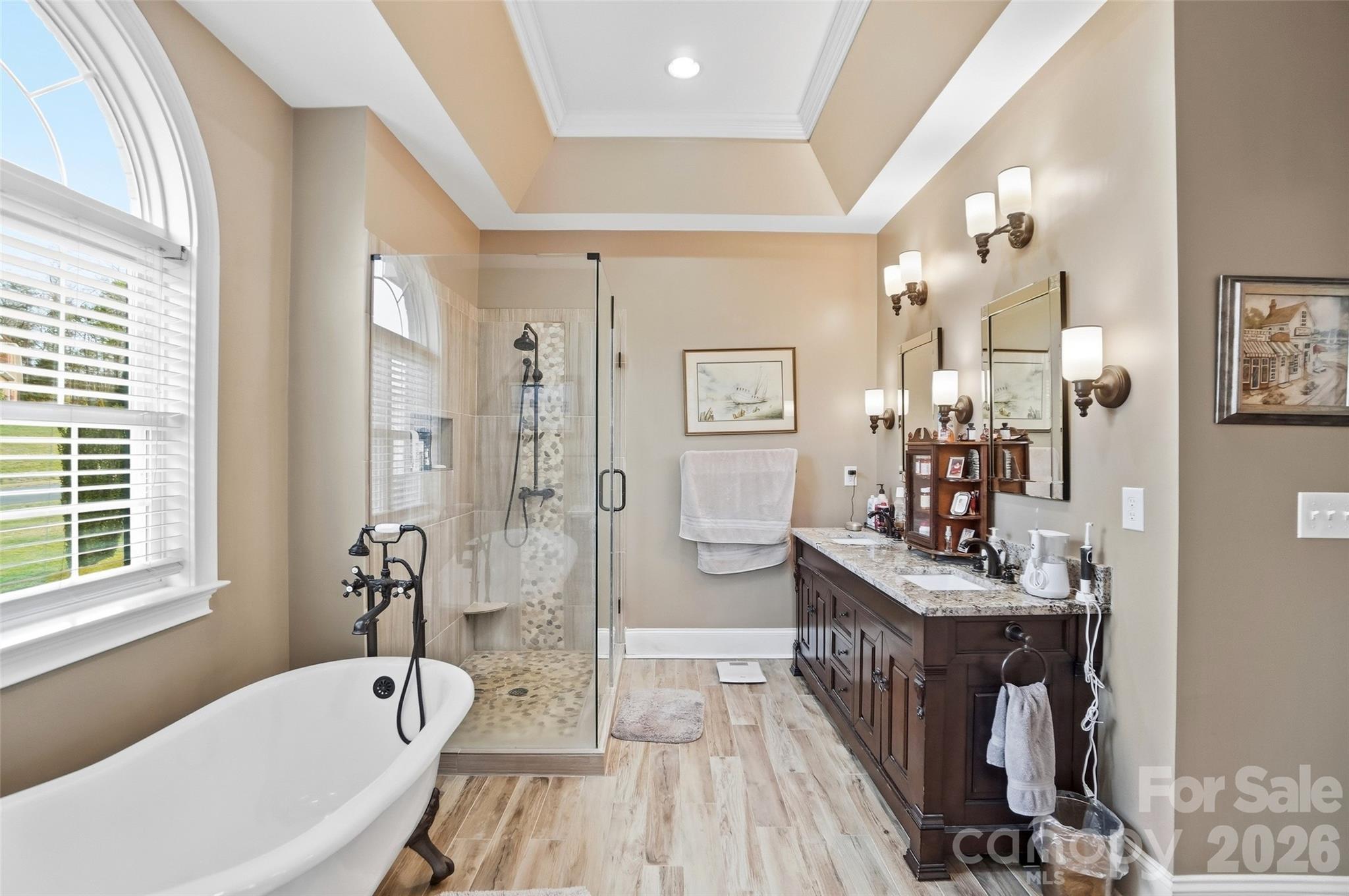 704 Mayfield Court Fort Mill, SC 29715 - Photo 26 of 48 a spacious bathroom with a tub sink and mirror