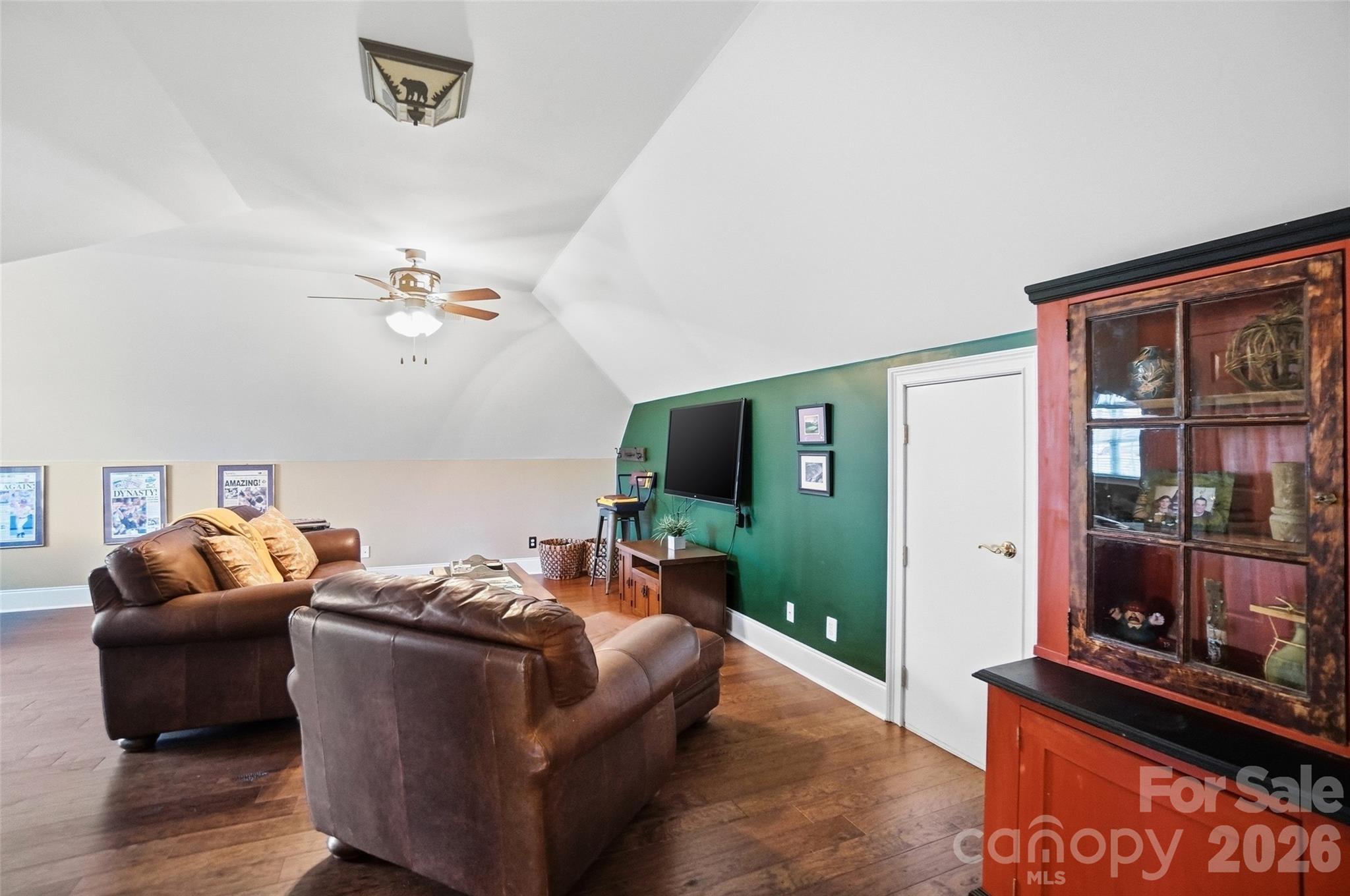 704 Mayfield Court Fort Mill, SC 29715 - Photo 35 of 48 a living room with furniture and a flat screen tv