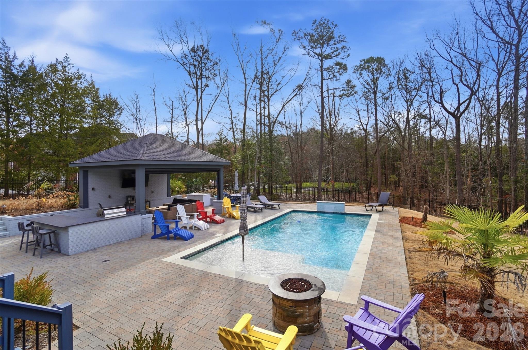 704 Mayfield Court Fort Mill, SC 29715 - Photo 40 of 48 a view of a swimming pool with a patio
