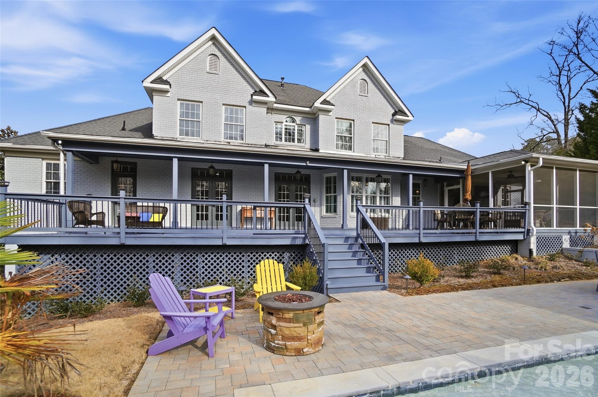 704 Mayfield Court Fort Mill, SC 29715 - Photo 48 of 48 a front view of a house with swimming pool and sitting area