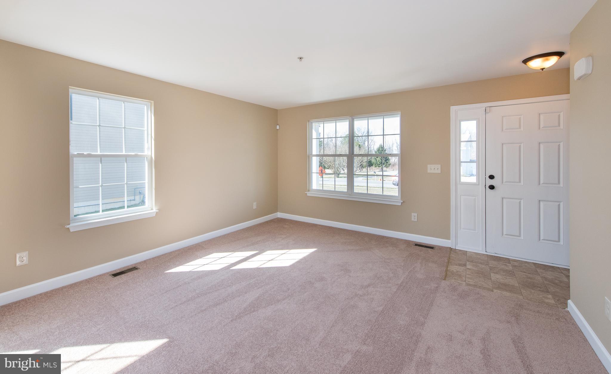 1005 Wampler Road Baltimore, MD 21220 - Photo 2 of 30 a view of an empty room with a window