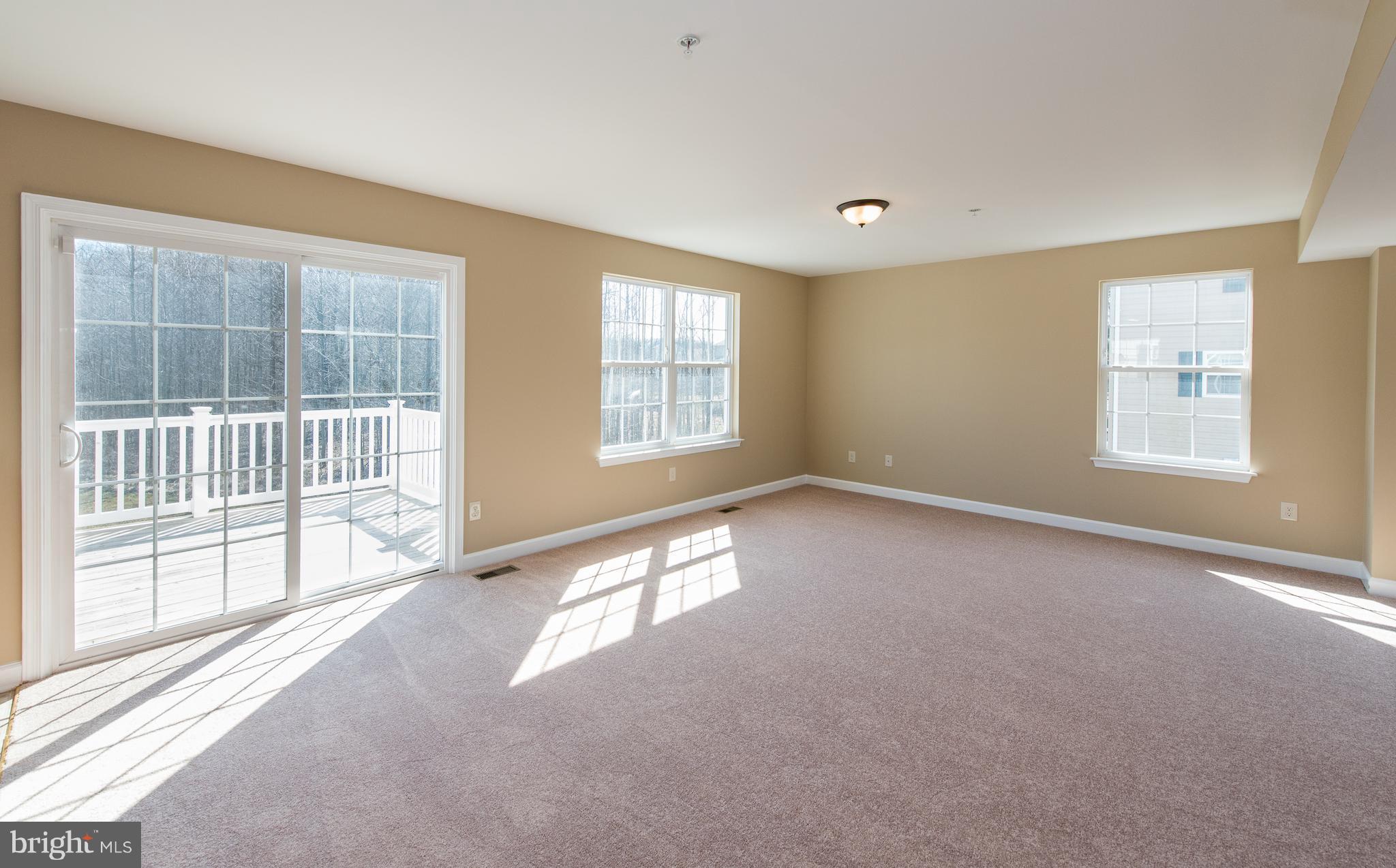 1005 Wampler Road Baltimore, MD 21220 - Photo 14 of 30 an empty room with windows