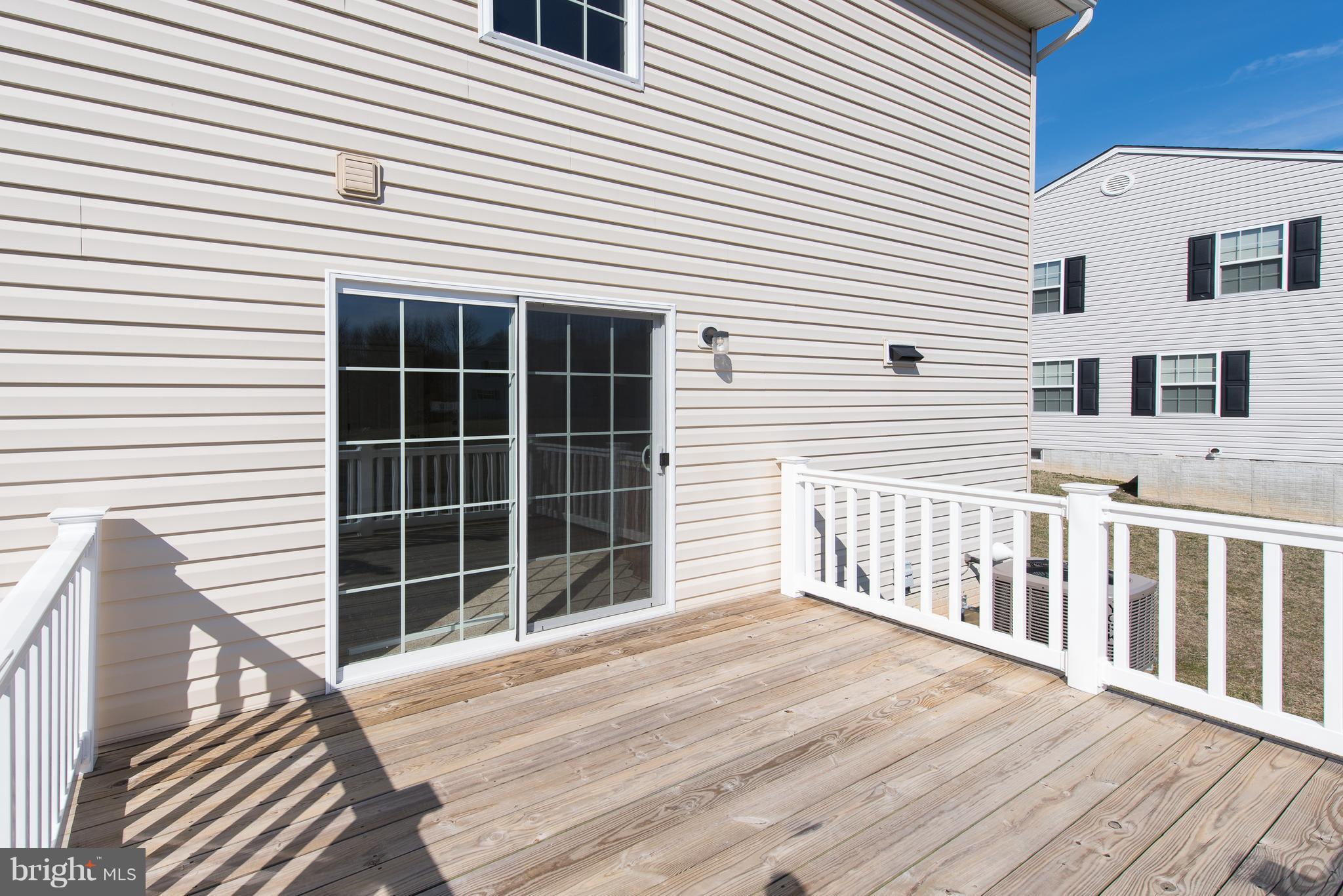 1005 Wampler Road Baltimore, MD 21220 - Photo 28 of 30 a view of a house with a balcony